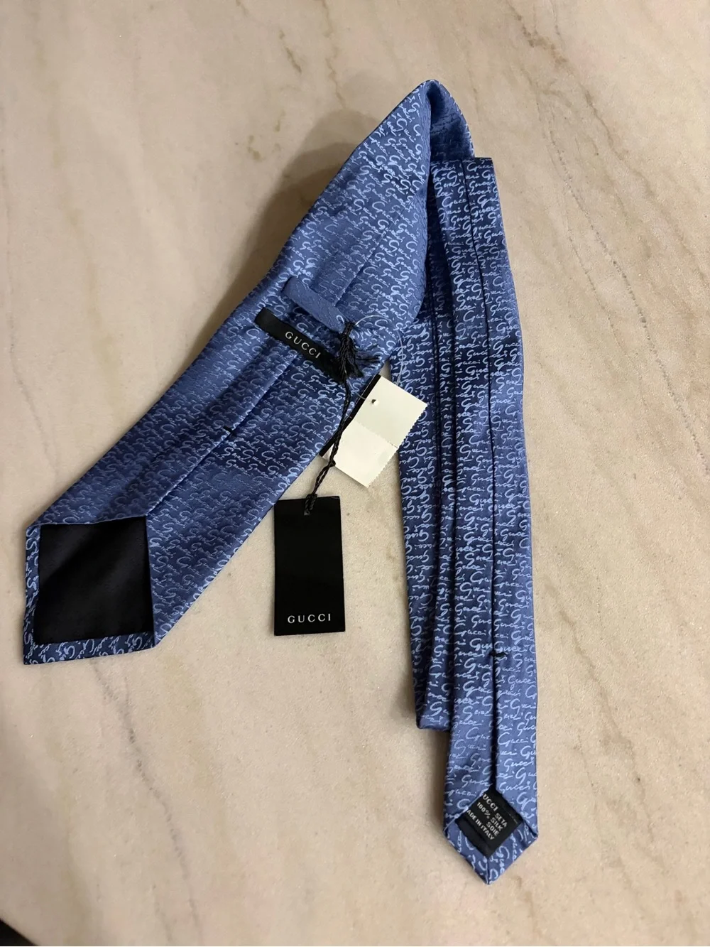 Gucci Blue Silk Tie, featuring a signature monogram pattern blue silk New tags